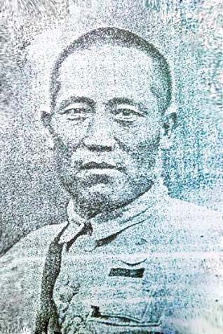 梁冠英